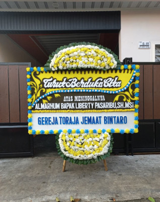 Papan Bunga Duka di Temoyong